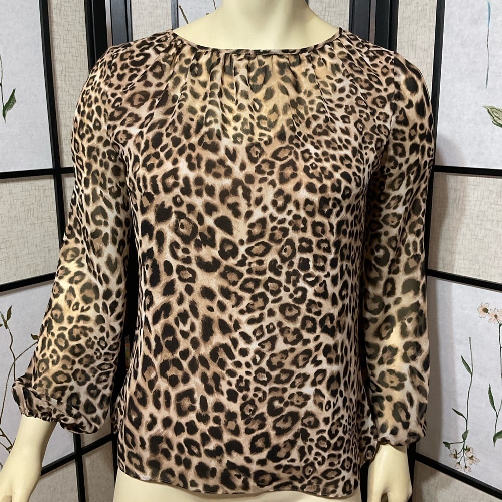 White House Black Market Animal Print Sheer Top with V-Neck underblouse.
